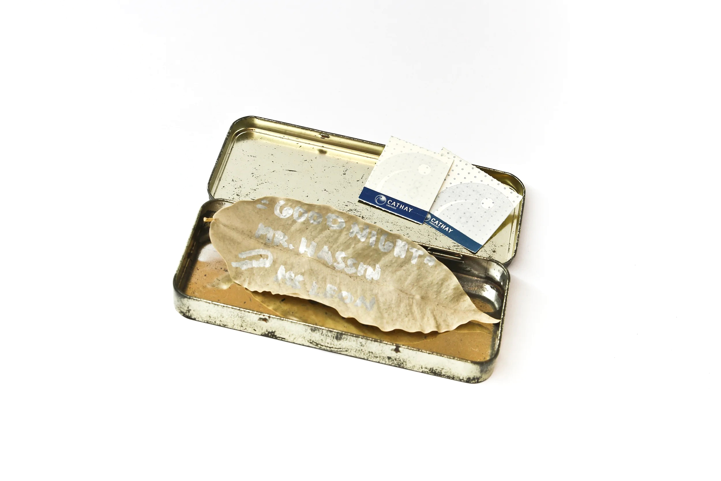 Dried leaf with cinema ticket stubs